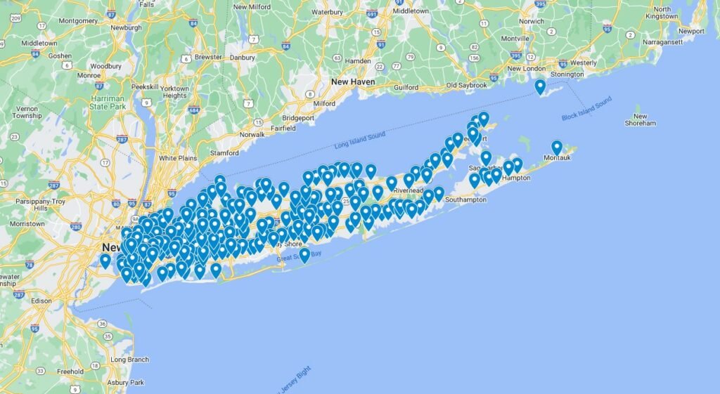 Map of Long Island, New York, dotted with numerous blue location markers indicating various points of interest and locations along the island's length.